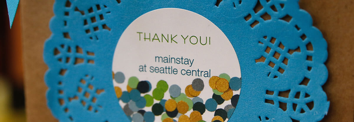 Up close of Mainstay thank you card at donor event